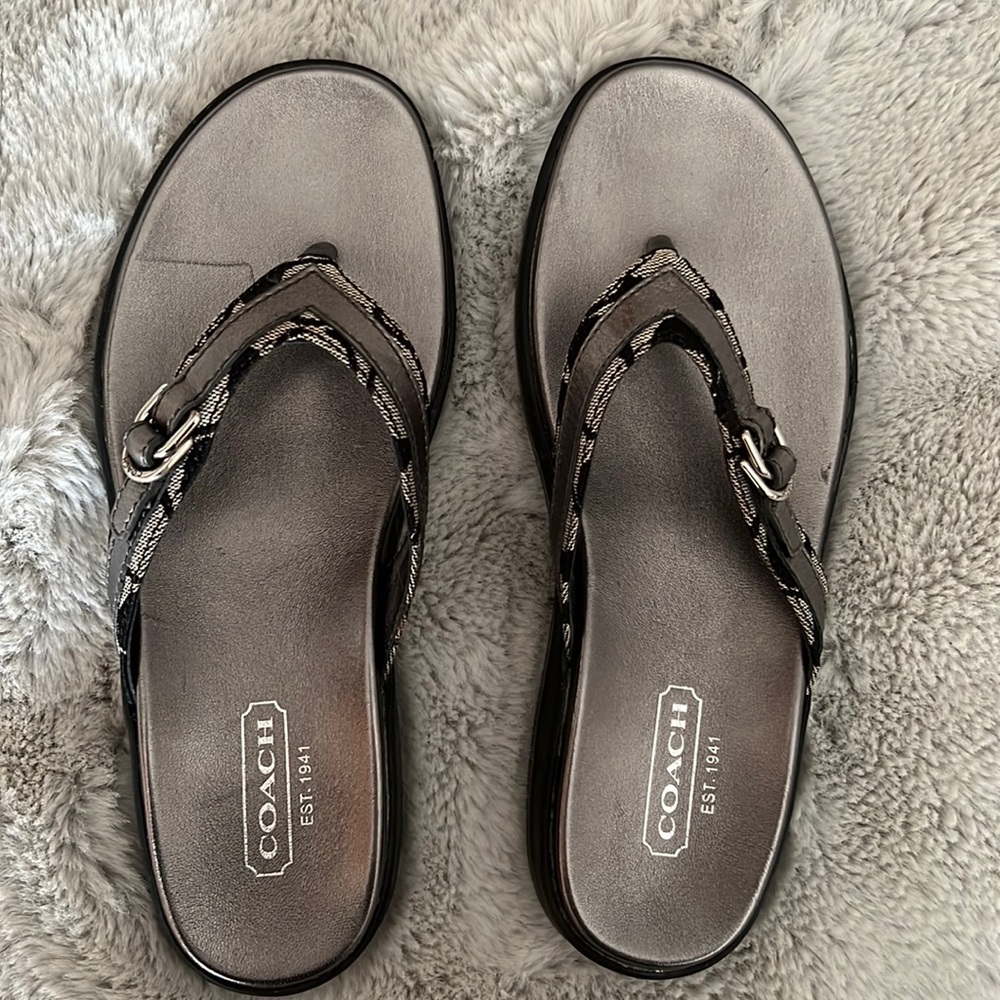 Coach thong sandals. Authentic, NWOT metallic silver leather. Size 8.5 M.